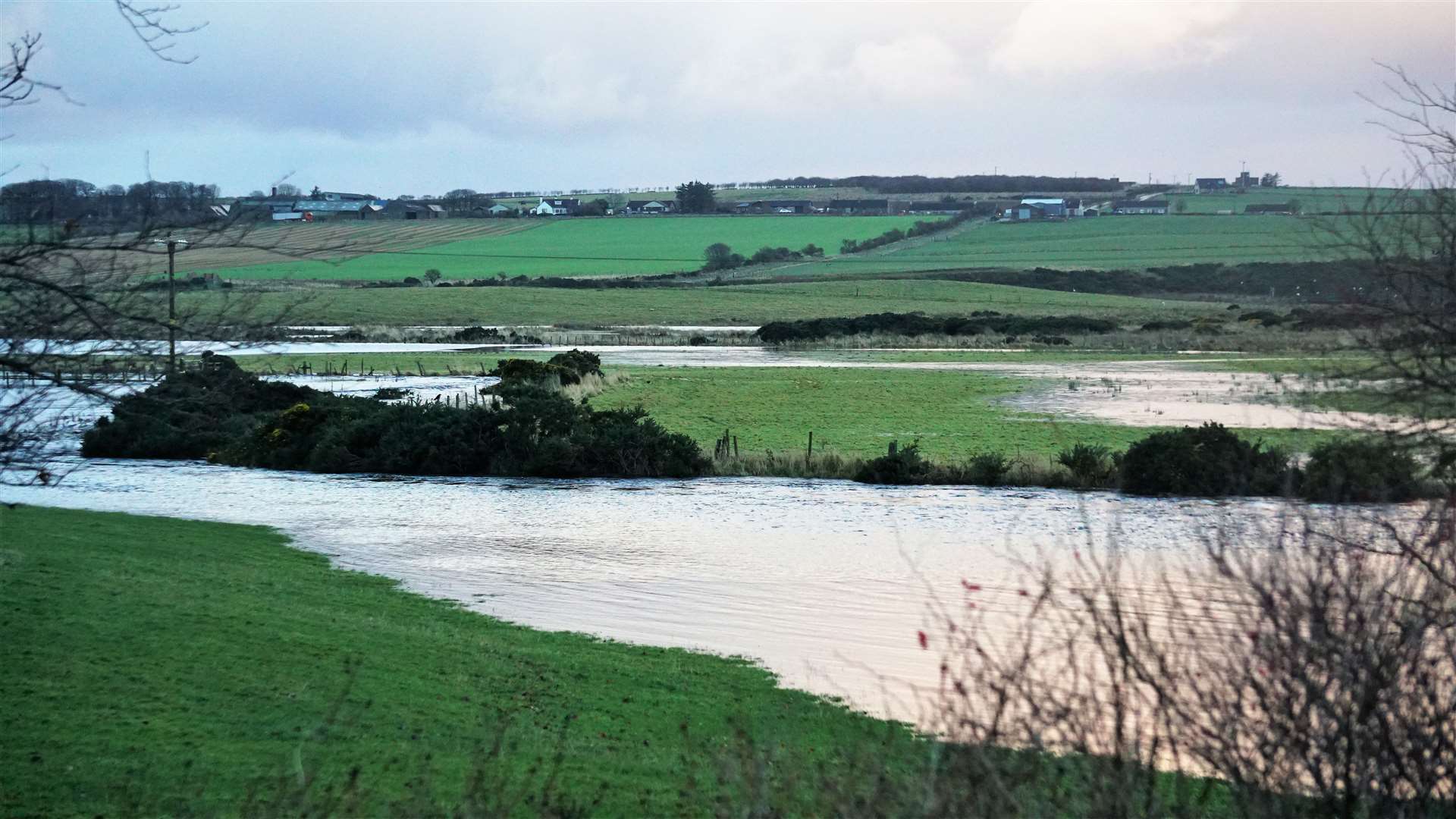 Wick River floods fields close to Haster. Picture: DGS