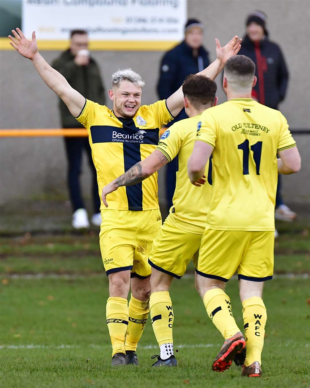 Jack Henry and Davie Allan celebrate with Jack Halliday after the Wick Academy captain opened the scoring at Christie Park. Picture: Mel Roger