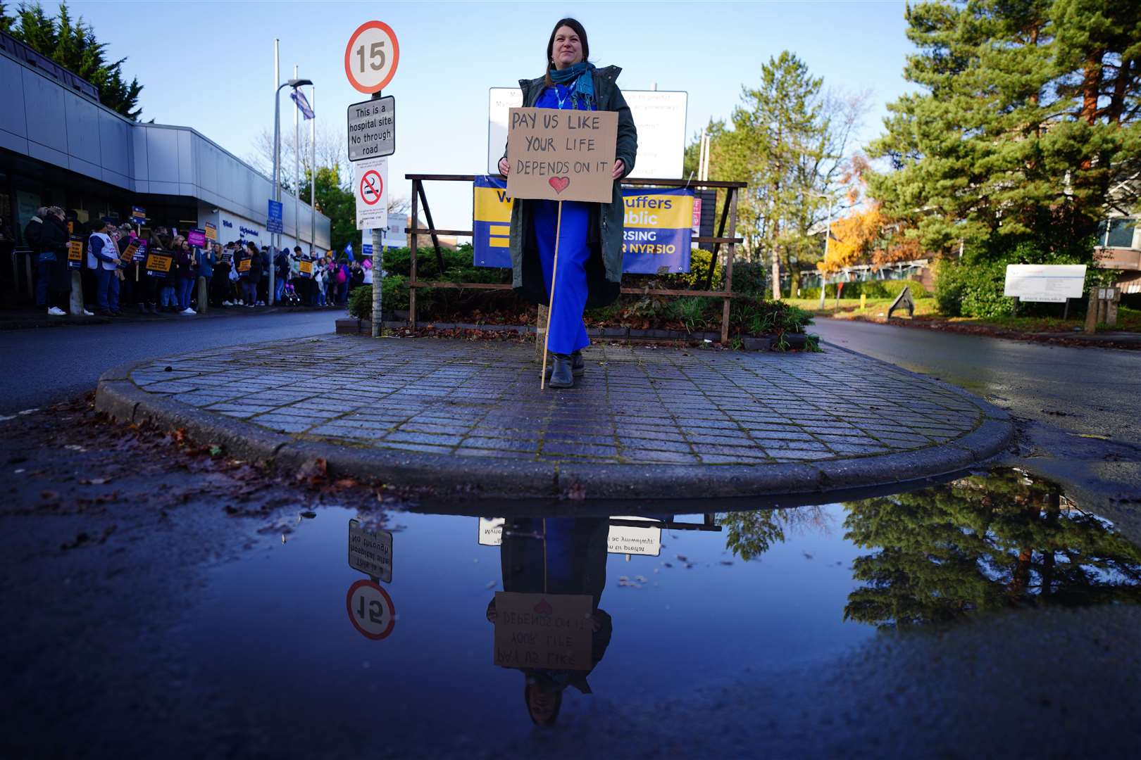 Madelaine Watkins joins members of the Royal College of Nursing on the picket line outside the RCN offices by Cardiff University Hospital, as nurses in England, Wales and Northern Ireland take industrial action over pay (Ben Birchall/PA)