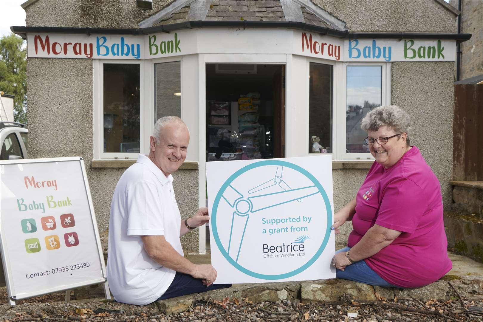 Ian and Susan Sutherland of Moray Baby Bank which received funding from the Beatrice Partnership Fund to buy a new electric van for use in collecting donated baby items for distribution to families in need of support. Picture: Ewen Weatherspoon