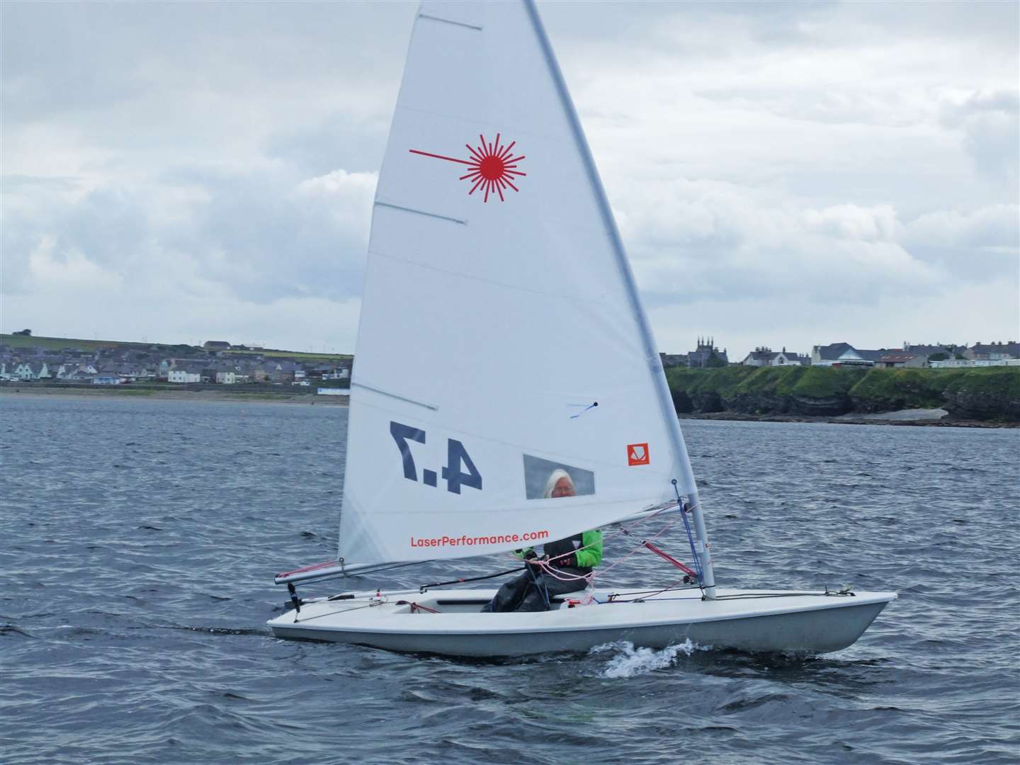 Marjory Lord in her Laser enjoying the conditions in Thurso Bay at the weekend.