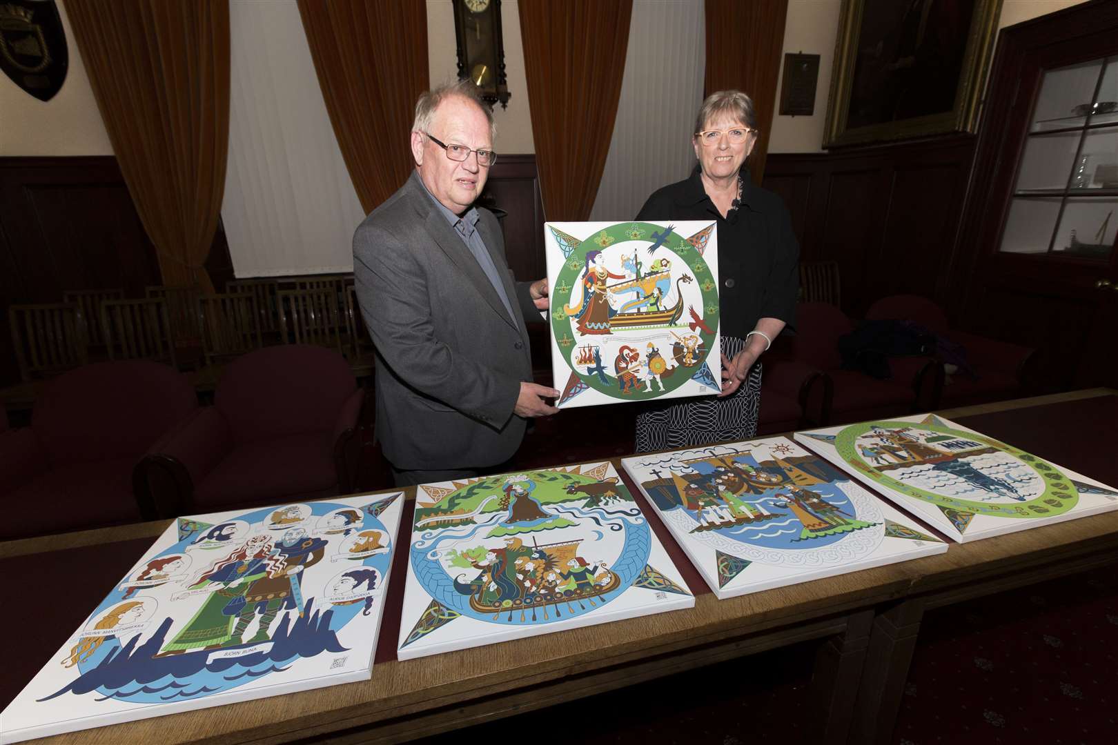 Iceland's contribution to the Scottish Diaspora Tapestry was unveiled in Wick Town Hall on Friday evening when Wick Society chairman Ian Leith accepted canvas prints of the embroidery panels from Bryndis Simonardottir, the Icelandic coordinator of the craftwork. Picture: Robert MacDonald / Northern Studios