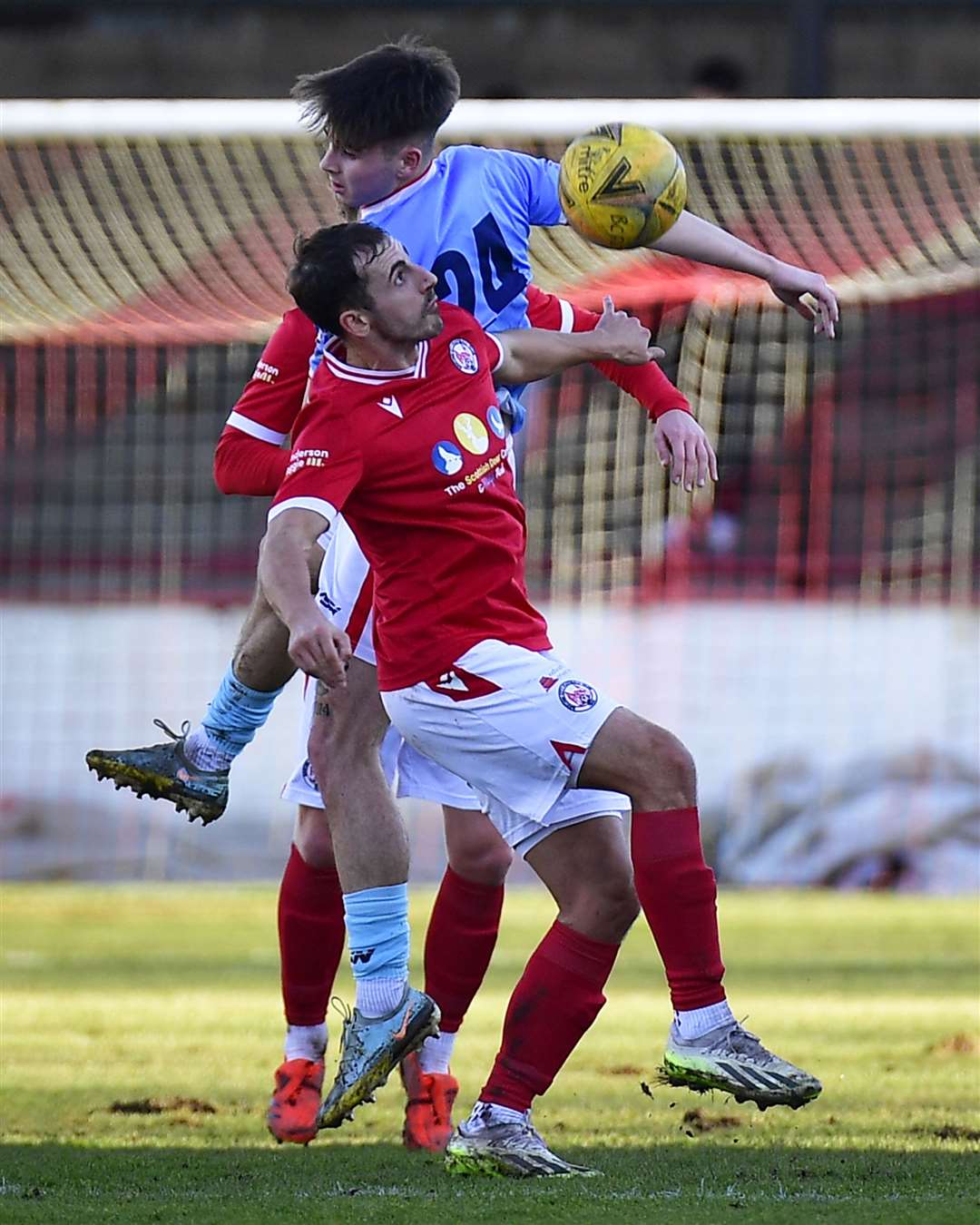 Wick Academy's Gary Pullen and Brechin City's Murray Mackintosh go for a high ball. Picture: Mel Roger