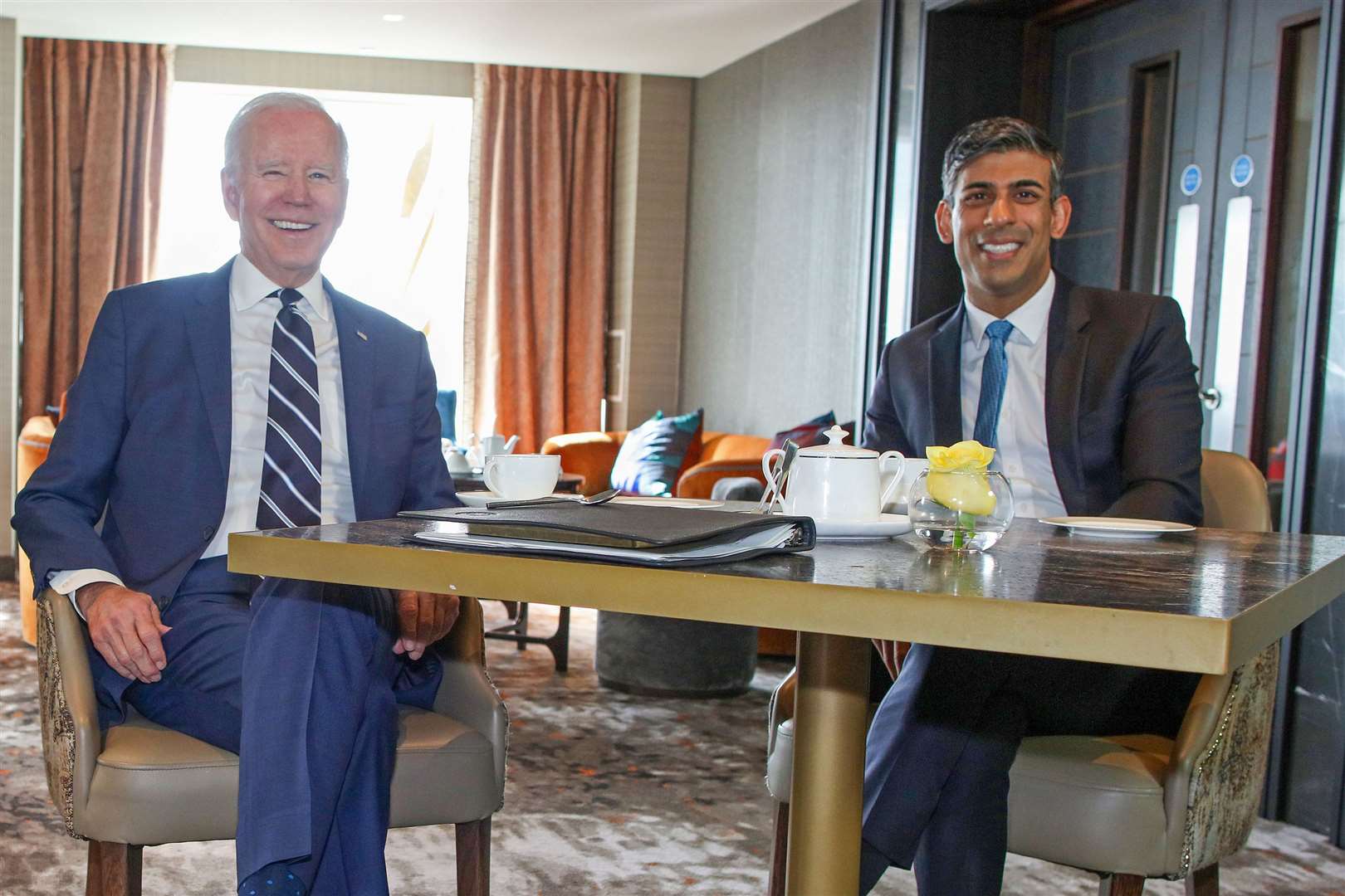 Prime Minister Rishi Sunak meets Joe Biden at the Grand Central Hotel in Belfast (Paul Faith/PA)