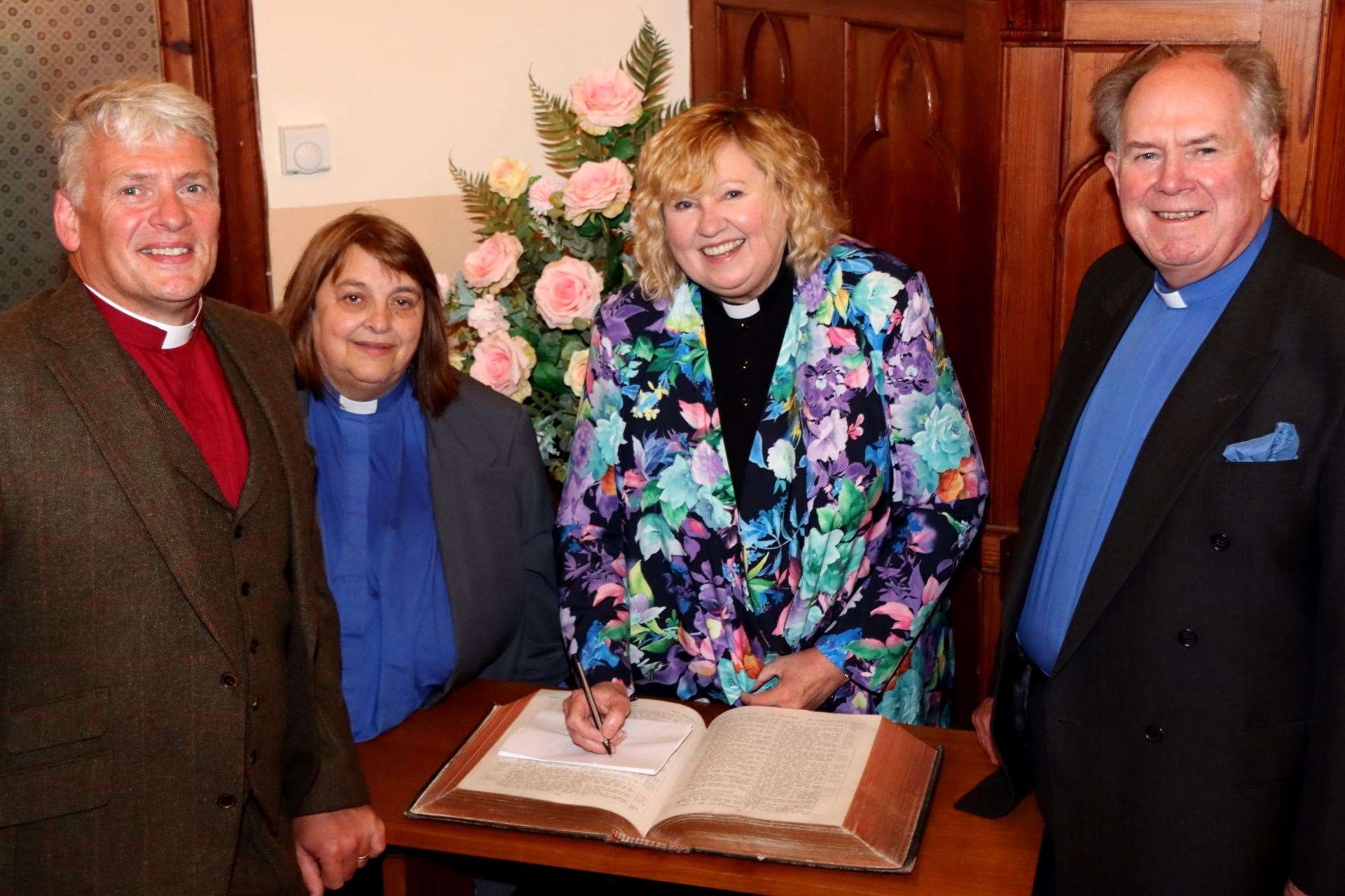 The Rev Janet Easton-Berry, the new minister for the Pentland Parish (centre), after the induction service with (from left) the Rev David Malcolm (Thurso St Peter's and St Andrew's Church), the Rev Heather Stewart (presbytery clerk), and the Rev Lyall Rennie (moderator of Caithness Presbytery). Picture: Neil Buchan