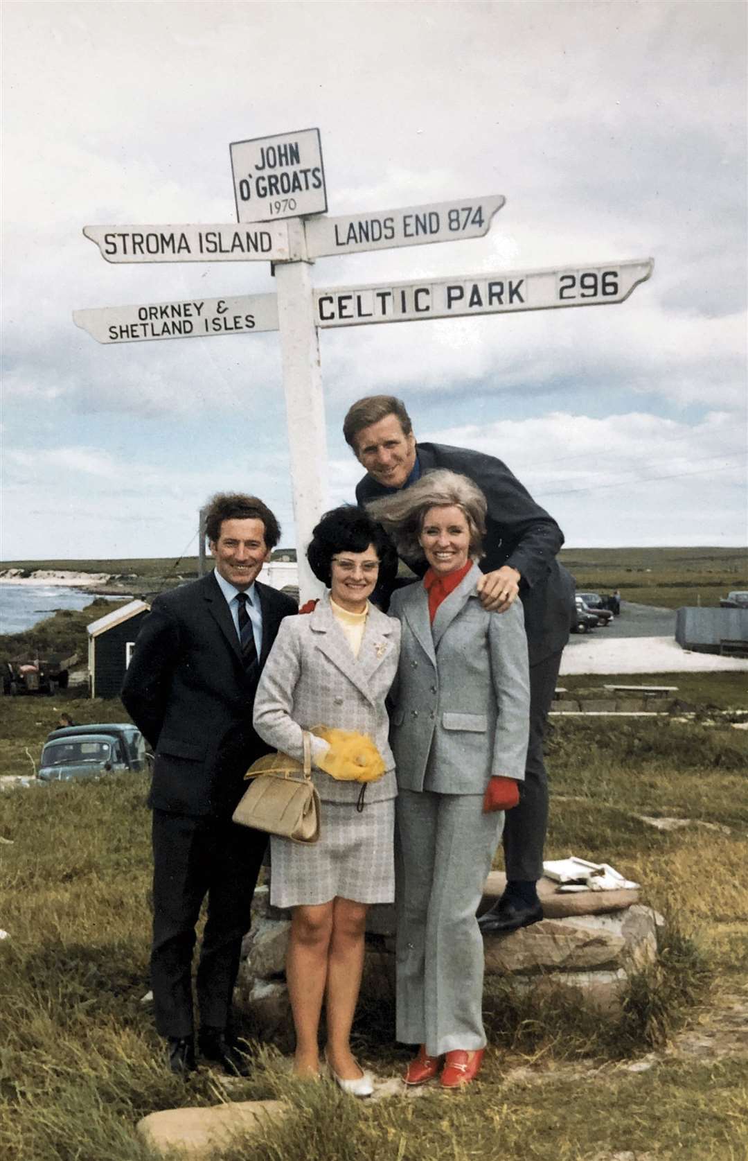Billy McNeill and his wife Liz with Caithness Celtic Supporters Club representatives Robin More and Sheena Miller at the John O'Groats signpost in July 1970. Picture: Caithness CSC