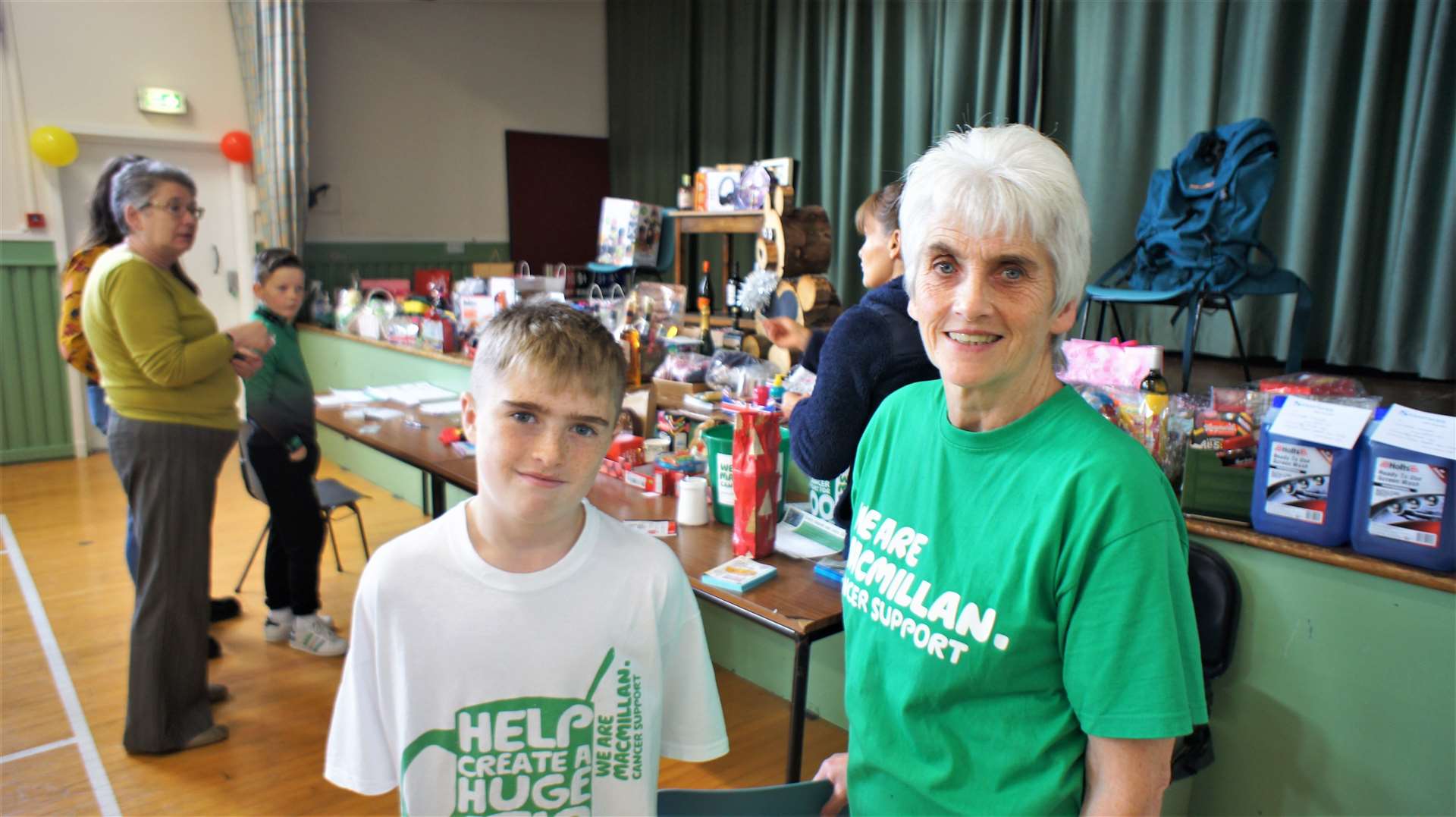 Dianne Mackay with her grandson Olly at the Macmillan coffee morning event in Watten Village Hall. Picture: DGS