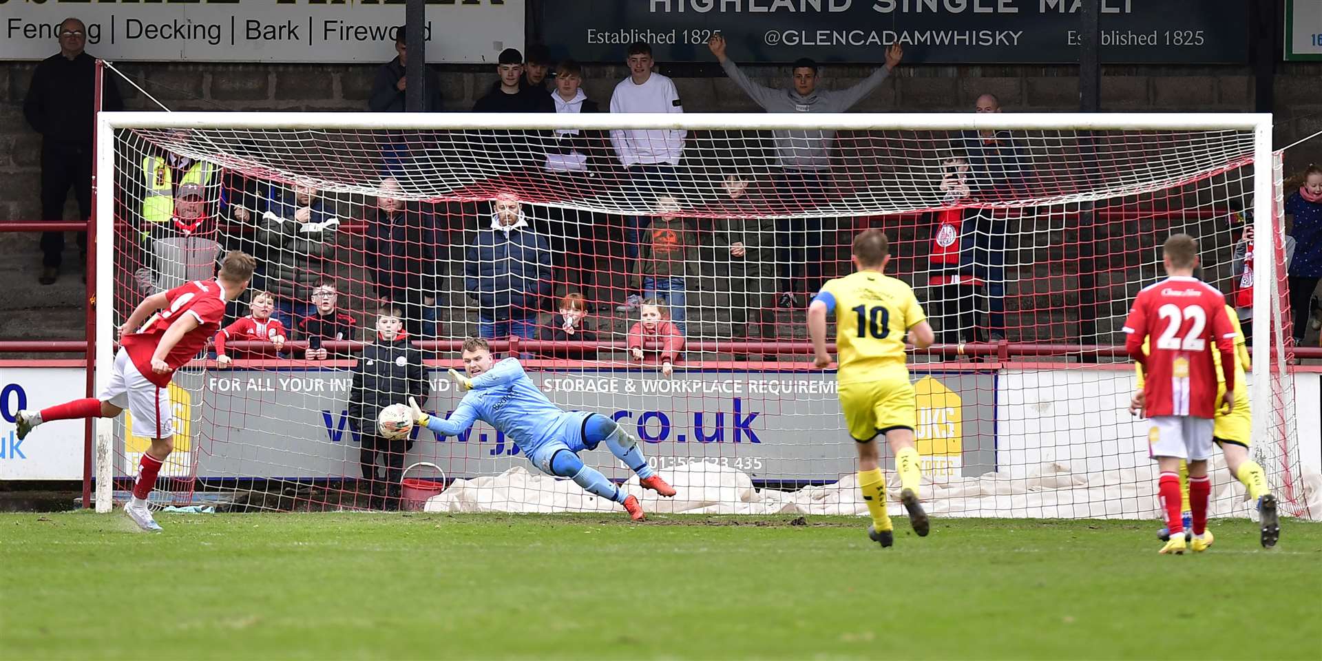 Wick Academy keeper Billy Miller saves a penalty from Brechin City's Grady McGrath during the 10-0 defeat at Glebe Park last March. Picture: Mel Roger
