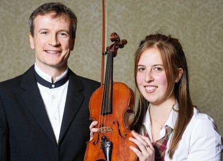 Garry with orchestra leader Helena Rose (15) from Lochaber High School.