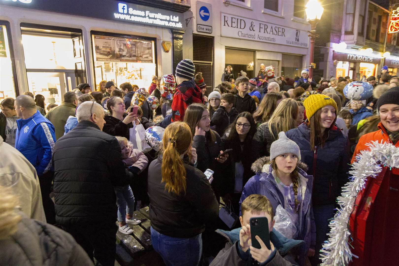 Crowds packed into Wick town centre on Saturday afternoon for the switch-on of the Christmas lights. Picture: Robert MacDonald / Northern Studios