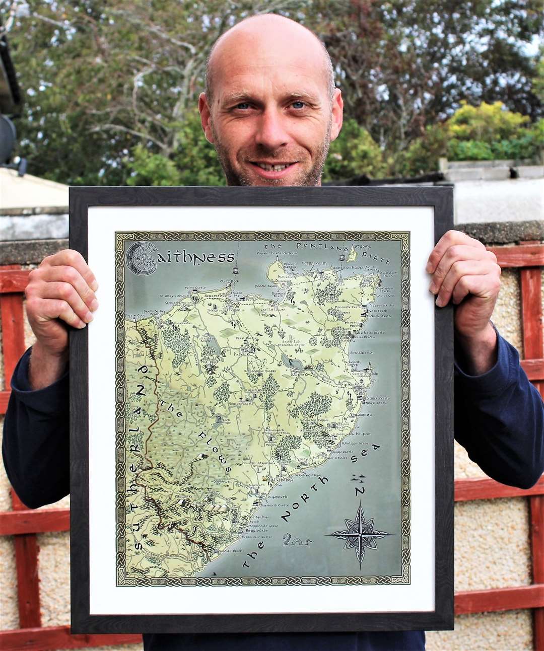 Iain Maclean, co-director of Caithness Broch Project, with the new fantasy map of Caithness.