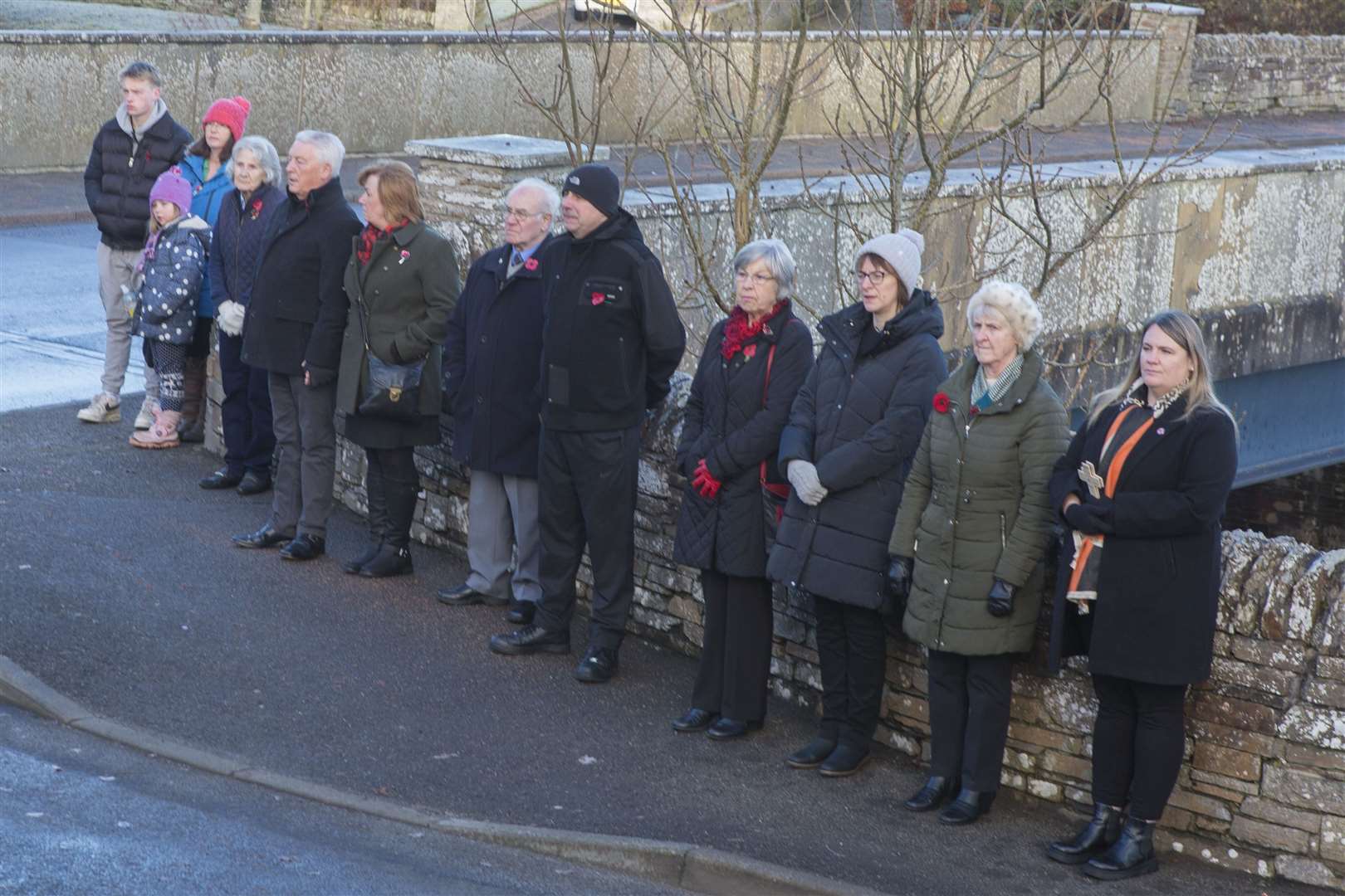 Some members of the public during the service at Halkirk War Memorial. Photo: Robert MacDonald/Northern Studios