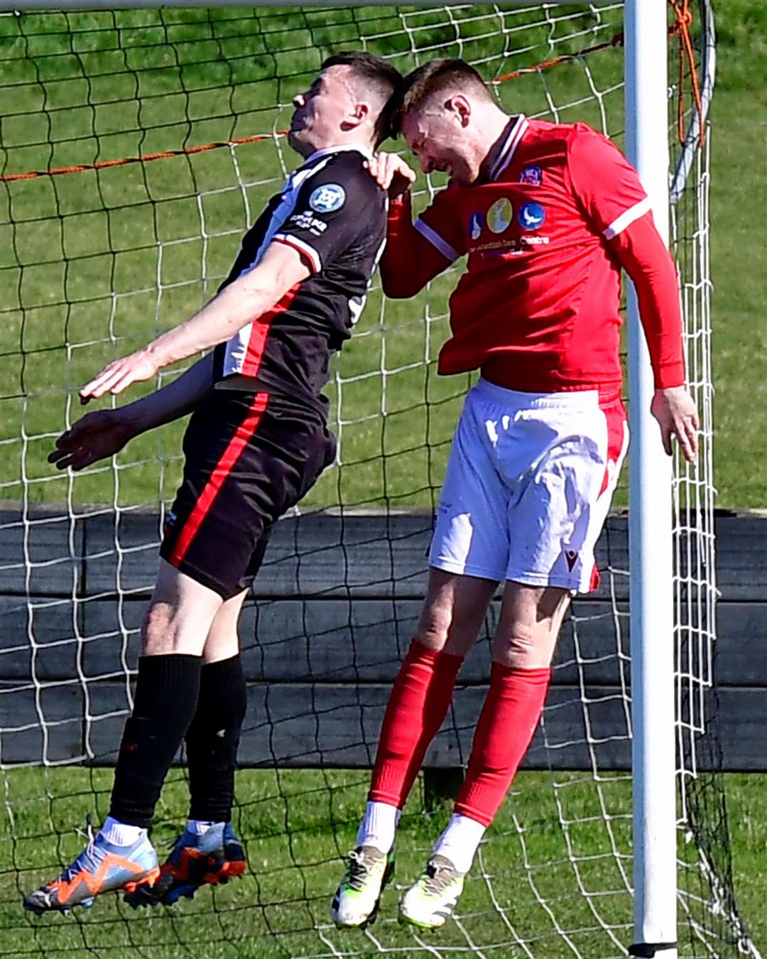 Brechin City's Lewis Martin and Wick's Ryan Campbell in a clash of heads. Picture: Mel Roger