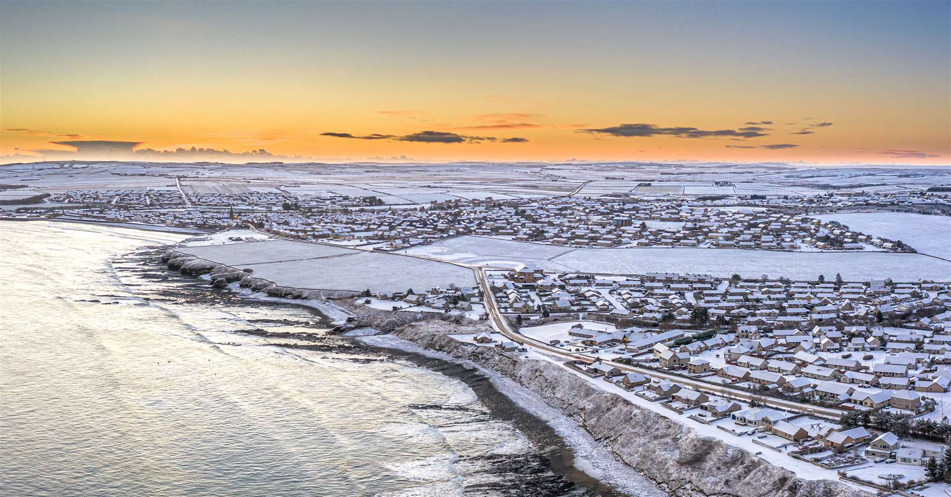 Thurso under a blanket of snow just before sunrise on Saturday in this drone image captured by local photographer Karen Munro.