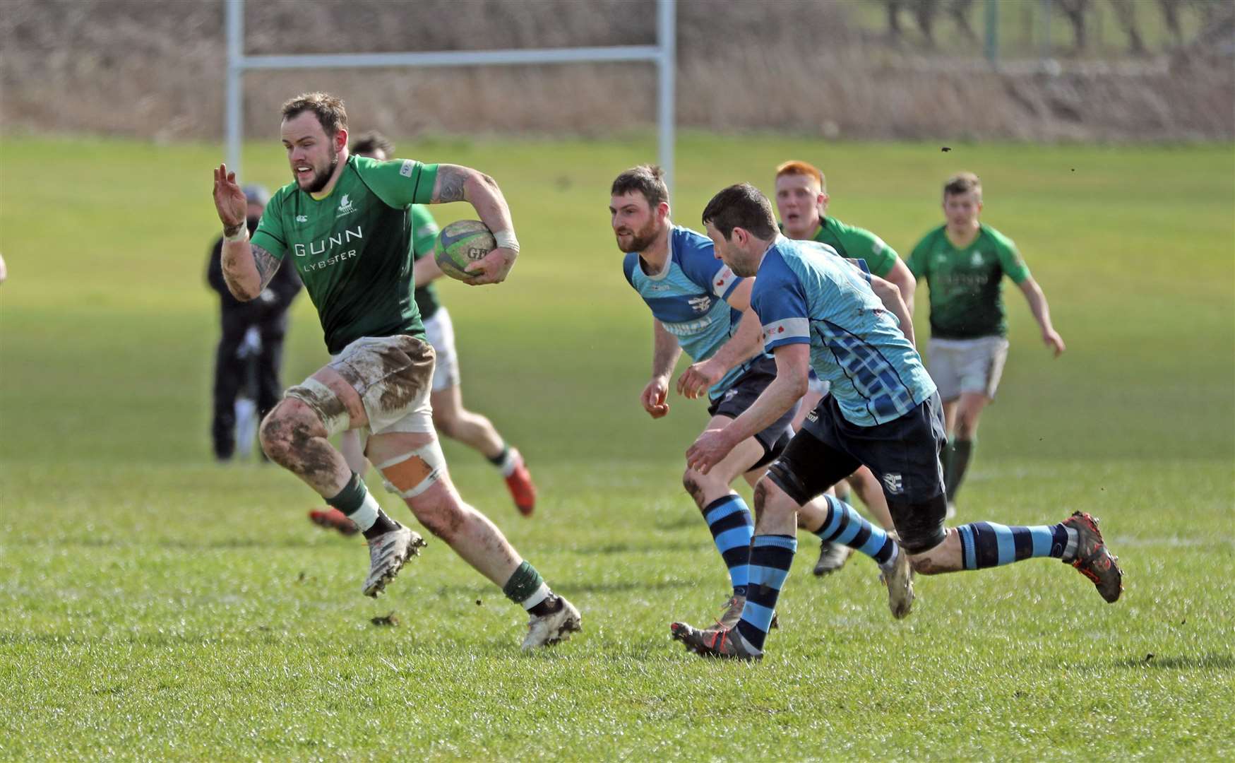 Grant Anderson breaks clear to score the opening try for Caithness. Picture: James Gunn