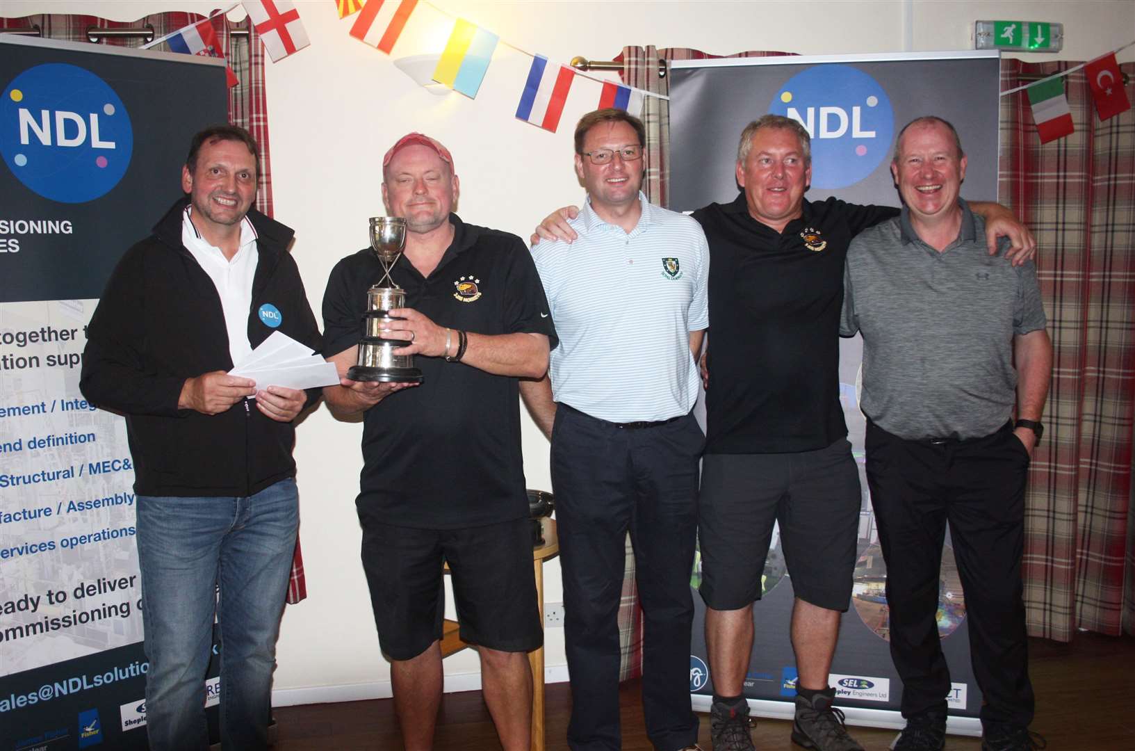 Reay Safari Open winners Summer Tactics being presented with the trophy by James Mowat of NDL. From left: James Mowat, Lee Parnell, Colin Paterson, Steve Efemey and Andrew Taylor