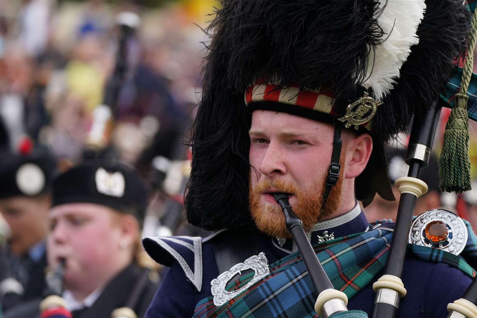The Braemar Gathering highland games are held a short distance from the royals’ summer retreat at the Balmoral estate in Aberdeenshire (Andrew Milligan/PA)