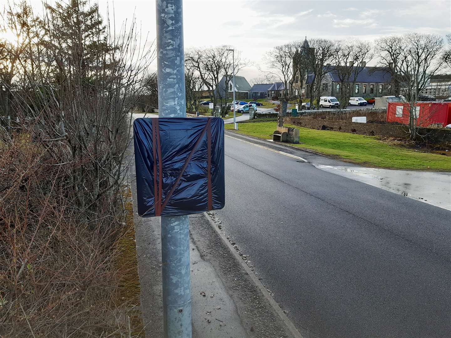 A covered-up minor injury unit sign on Thurso's Ormlie Road, near the Dunbar Hospital turn-off.