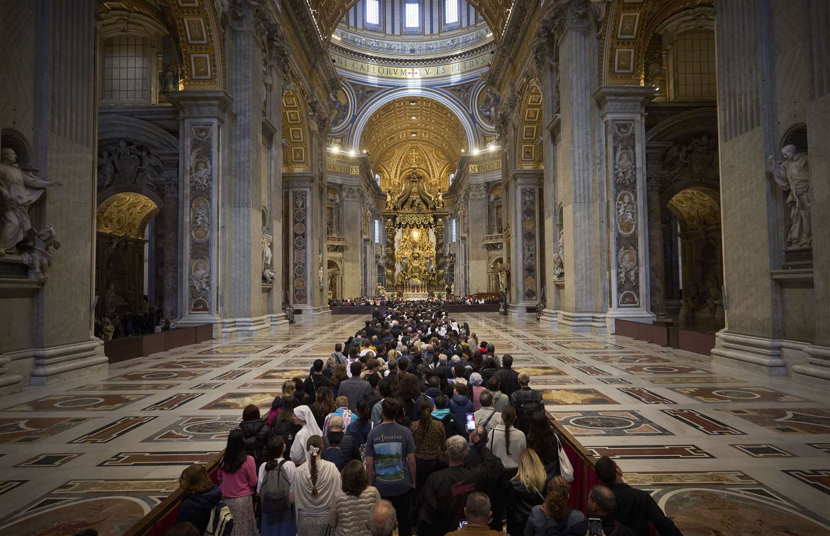 People line up as they enter St Peter’s Basilica to pay their respects to Pope Francis (Emilio Morenatti/AP)