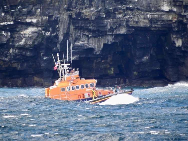 Wick RNLI Lifeboat the Roy Barker II makes its way into Sinclair's Bay to search for the missing paddleboarder. Picture: FV Reaper