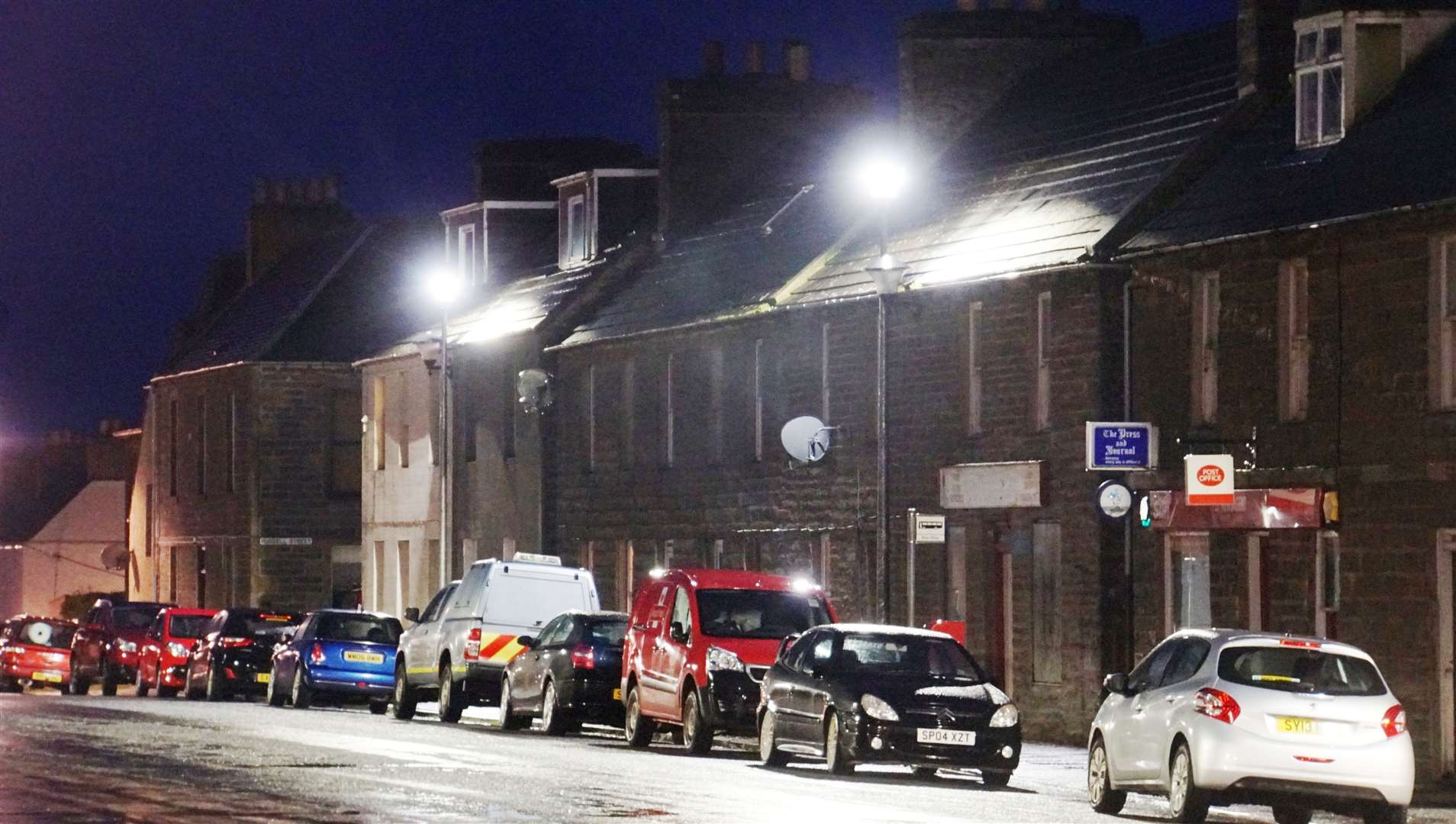 New street-lighting in Lybster has been criticised for illuminating house roofs more than the pavement below.
