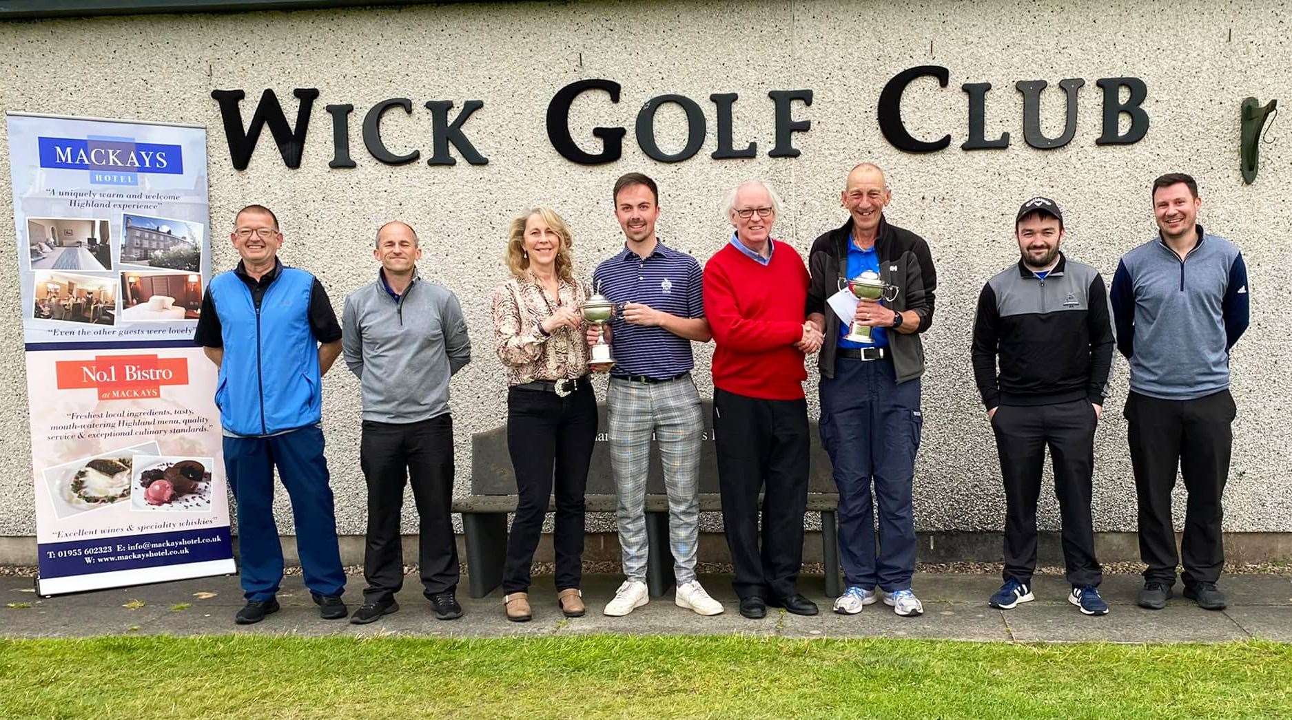 From left: Sanders Harper, Nicky Klimas, Ellie Lamont, Gregor Munro, Murray Lamont, David Brims, Stuart Steven and Michael Smith after the 36-hole Donald Lamont Memorial Open at Wick Golf Club.