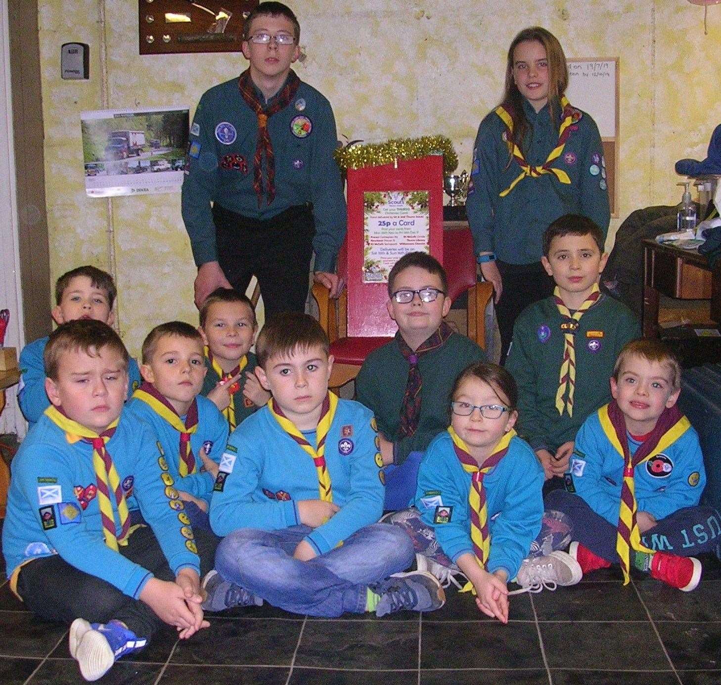 Some of the Thurso Scouts with one of the Christmas card postal boxes.