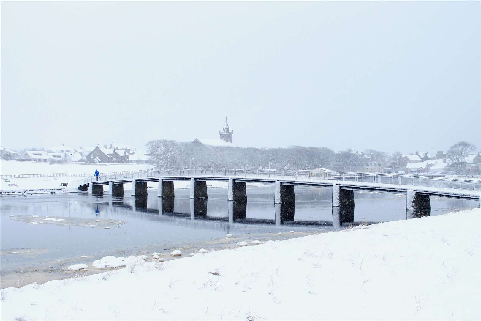 The Coghill footbridge at Wick riverside during a heavy snowfall on Tuesday. Picture: Alan Hendry