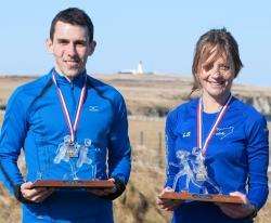 First home Andrew Douglas and Lorna Stanger, the leading woman, with their trophies. Scottish international Andrew Douglas, completed the 10k course in 31 minutes while Lorna took 42 minutes 20 seconds.