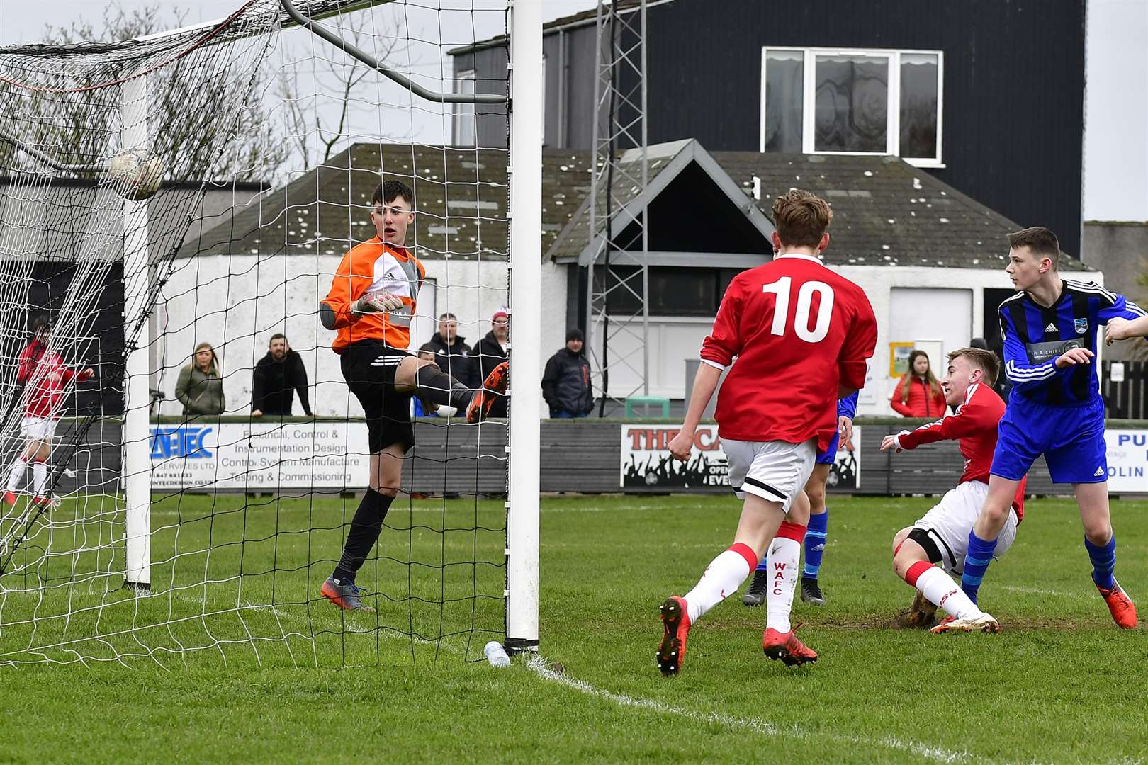 Sam Barclay makes it 2-0 to Wick Academy under-17s against Alness at Harmsworth Park. Picture: Mel Roger
