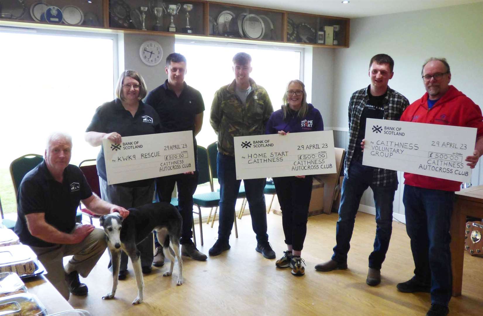 Representatives of three of the four charities collecting their cheques at Caithness Autocross Club's recent prize-giving.