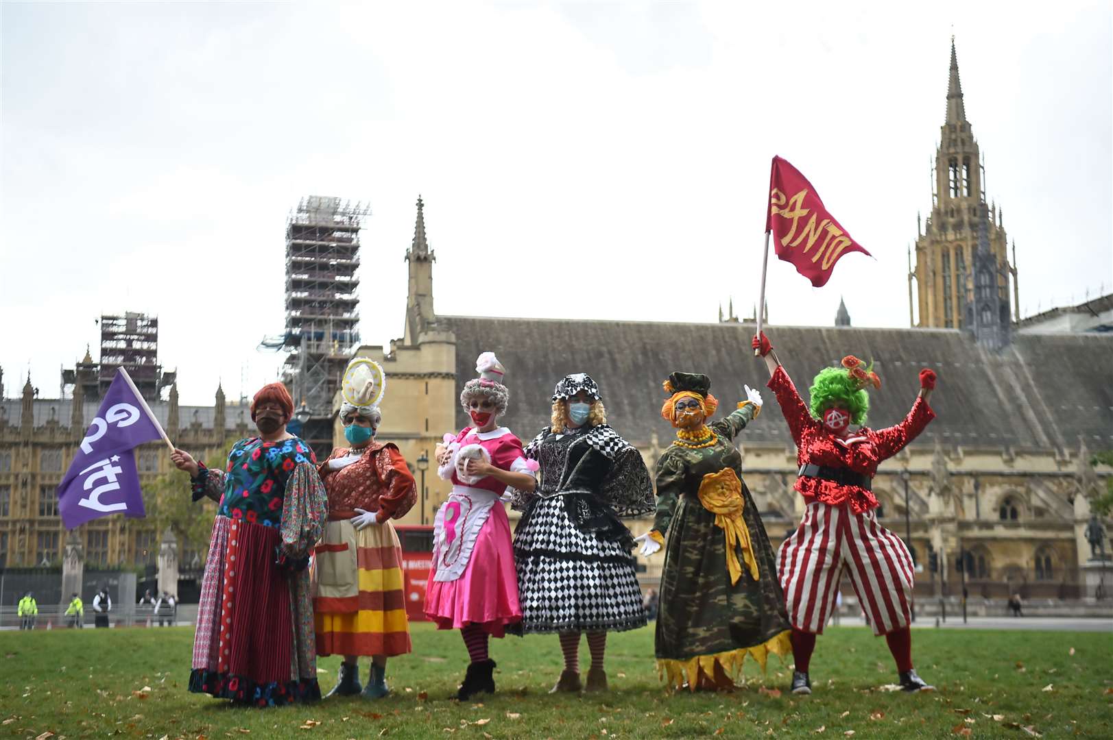 Pantomime dames in Parliament Square, London, as they join a rally to highlight the impact of the pandemic on live theatre (Kirsty O’Connor/PA)
