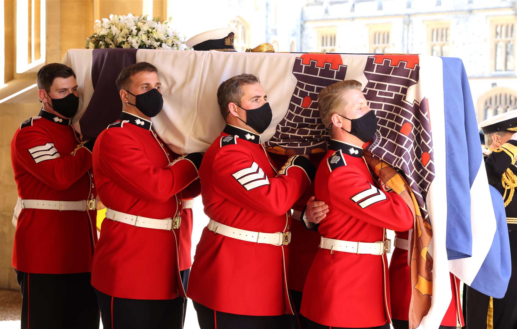 The Duke of Edinburgh’s coffin, covered with his personal standard, is carried ahead of the funeral (Chris Jackson/PA)