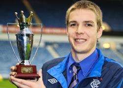 Thurso Rangers manager Alyn Gunn with the Davie Cooper Memorial Trophy at Ibrox on Saturday.