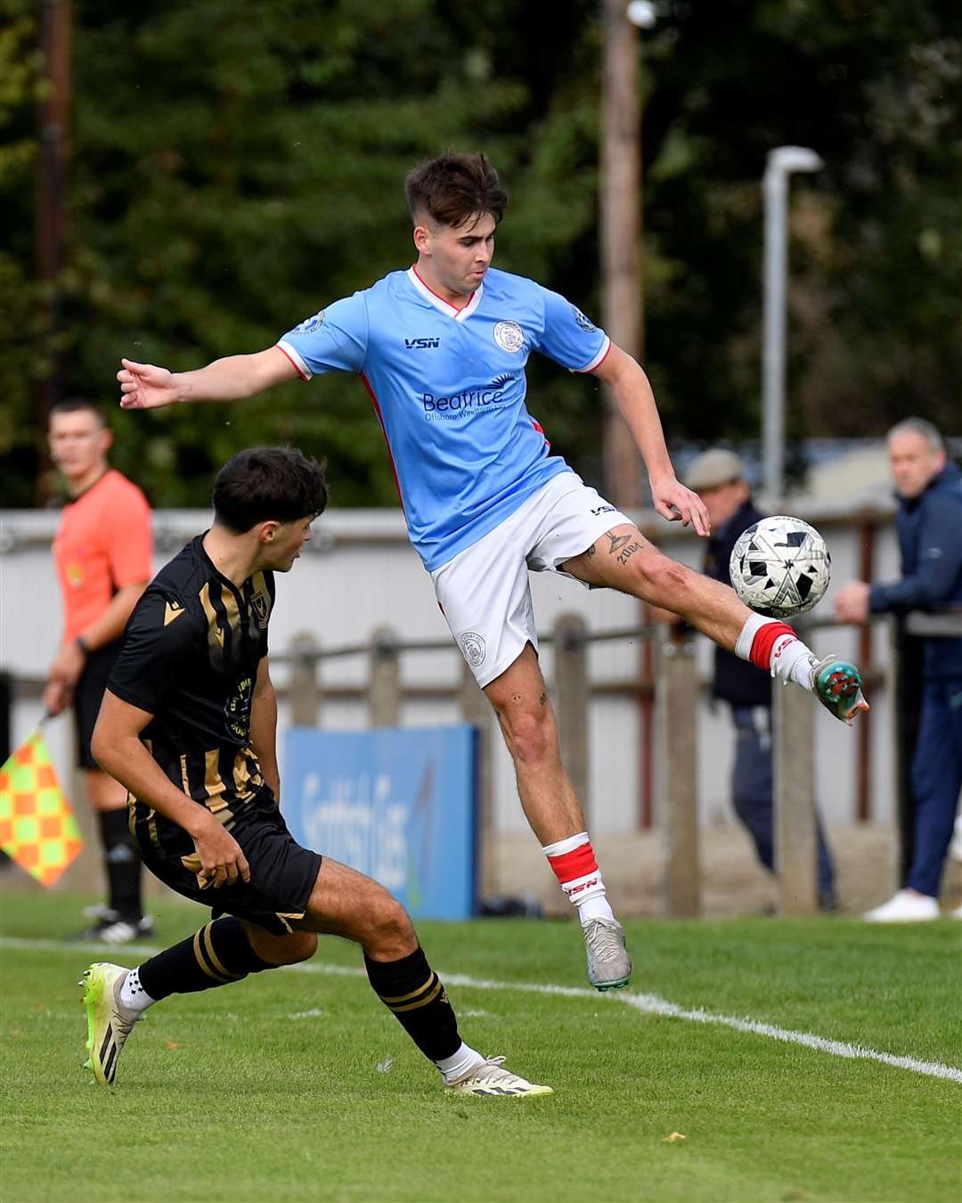 Wick Academy's Gary Pullen and Huntly's Kai Watson. Picture: Mel Roger