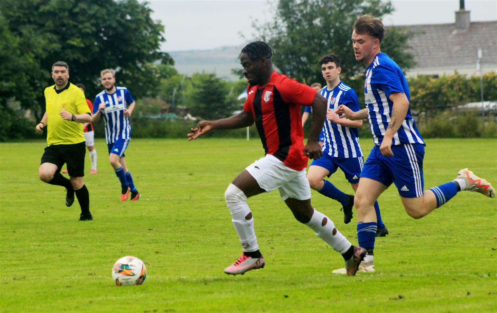 Ebisine Ambakederemo races into the box before setting up Swifts' first goal.