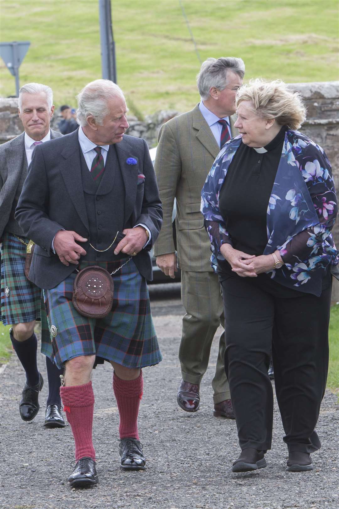 Prince Charles is accompanied along the path to Canisbay Church of Scotland by minister Rev Janet Easton-Berry, who recently took over the charge. Picture: Robert MacDonald/Northern Studios