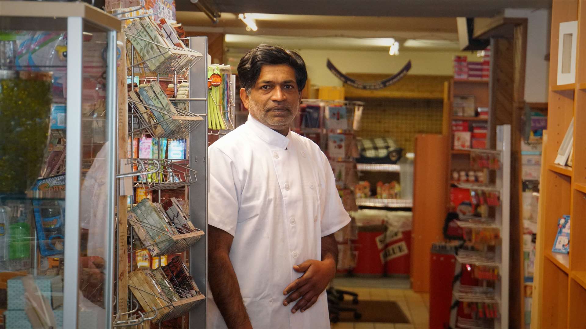 Josuva shows that there is more to his ground floor shop than just selling newspapers and has everything from dog chews to children's toys and stationery.
