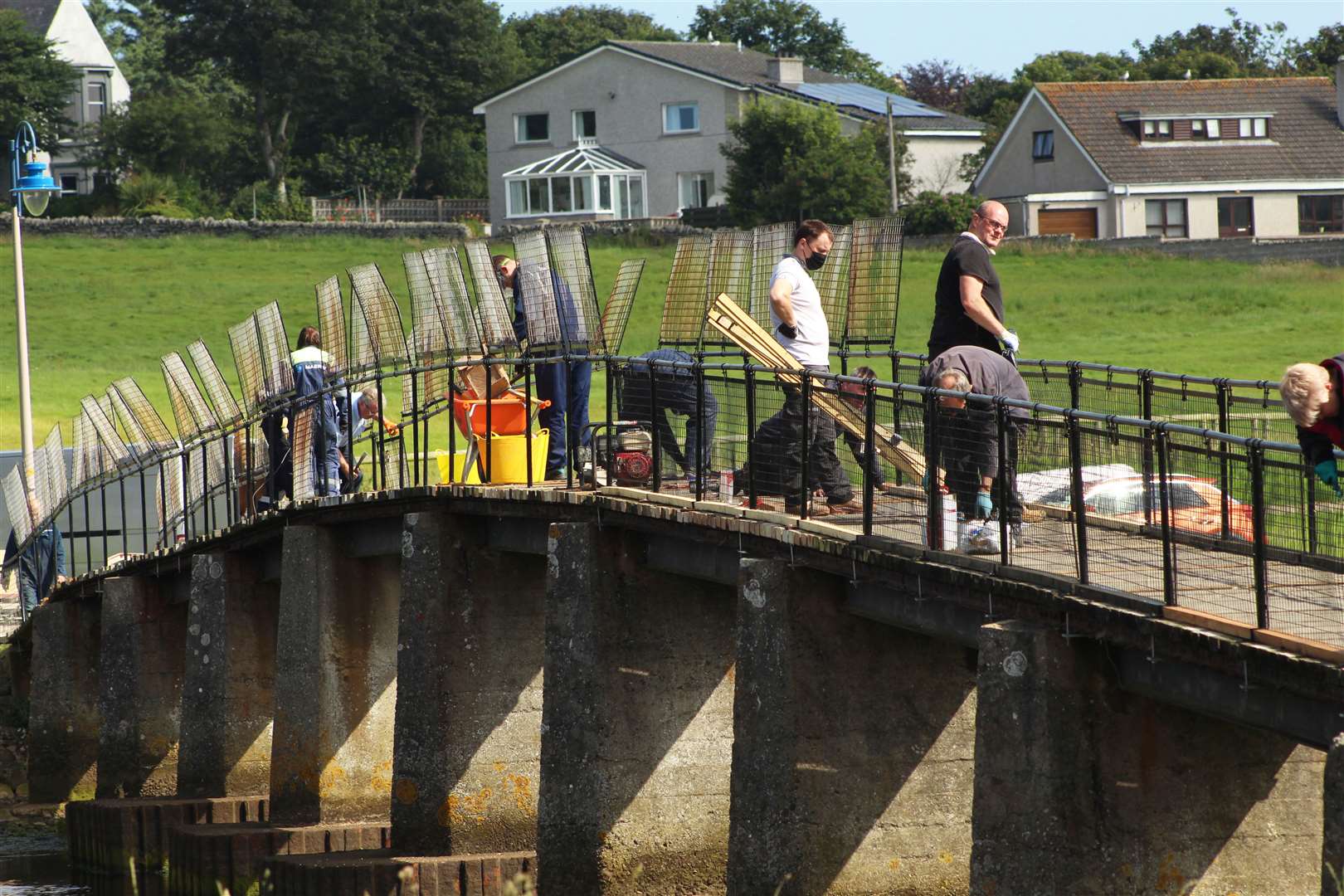 Some of the volunteers from Wick Paths Group hard at work on the main Coghill bridge last August. Picture: Alan Hendry