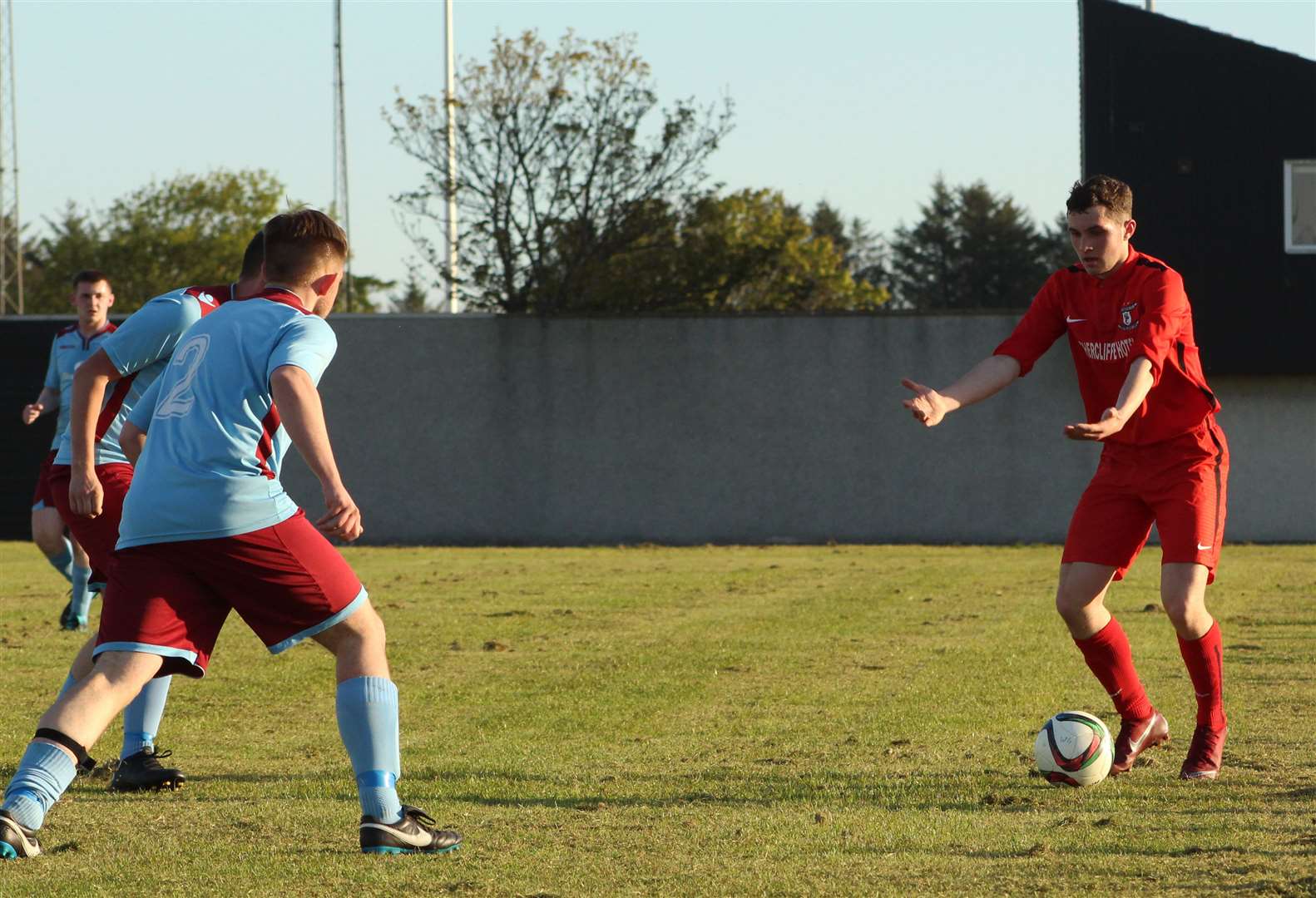Wick Groats' Ben Sinclair takes on the Pentland United defence.