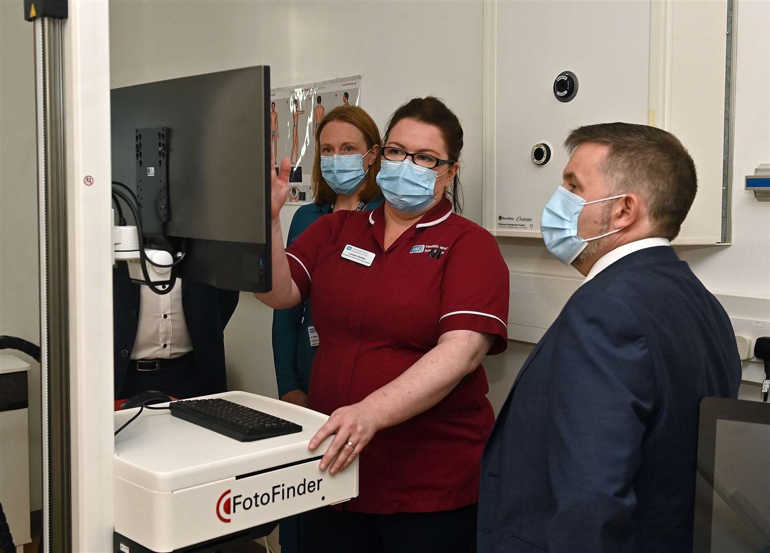 Health Minister Robin Swann at the launch of a new mole mapping service at the Ulster Hospital in Dundonald (Oliver McVeigh/PA)