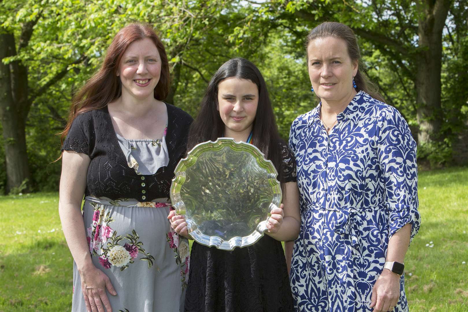 Rachel McBoyle, along with mother and daughter Elizabeth Jones-Singh and Olivia Singh, won the Margaret Henderson Memorial Trophy for chamber music. Elizabeth and Olivia also received the Wick Junior Scroll for chamber music level four. Picture: Robert MacDonald / Northern Studios