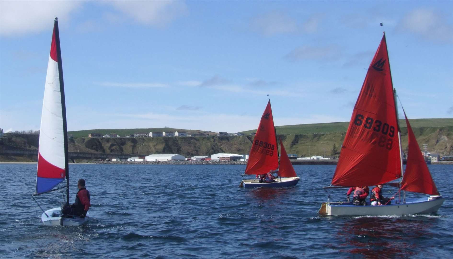 The Topper and two Mirror dinghies taking part in Sunday's event.
