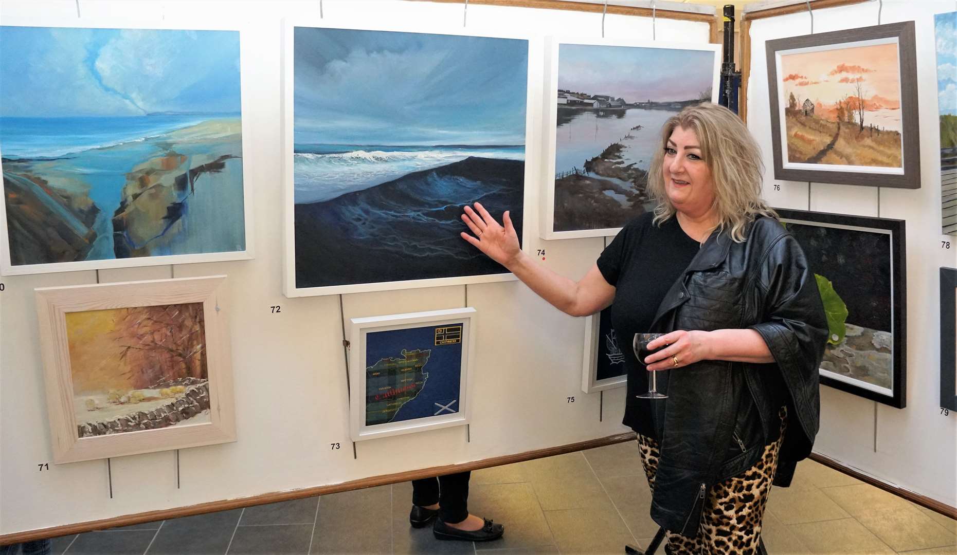 SCA regular, Jackie Newton, with some of her seascape works. Picture: DGS