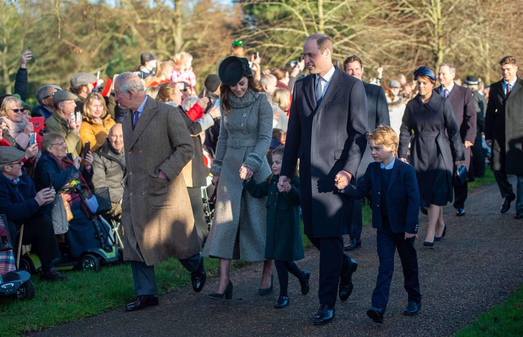 The King with the Prince and Princess of Wales, Prince George and Princess Charlotte arriving for the Christmas Day morning service at St Mary Magdalene Church in Sandringham in 2019 (Joe Giddens/PA)