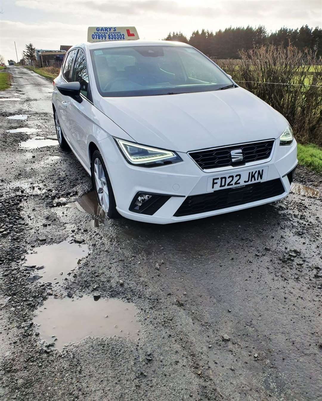 Gary Sinclair's car hitting a pothole near Wick.
