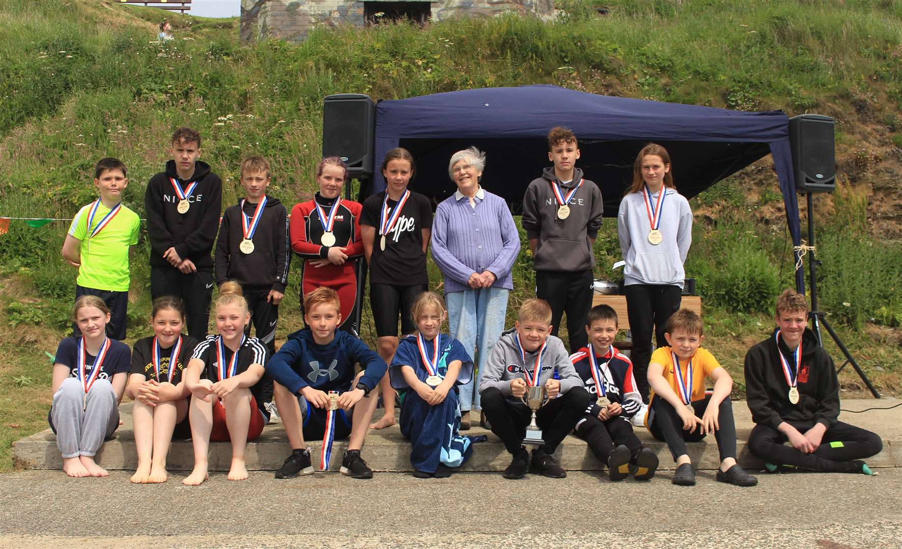 Swimmers from all the teams who took part, pictured with Joan Manson who presented the trophy and medals. Back row (from left): Thomas Merchant, Rhys Edwards, Ryan McNeill, Morven Miller, Carla Edwards, Owen Edwards and Tamzin Rosie. Front: Lena Forbes, Iona Gill, Eva Roberston, Joe Gill, Jolee Statham, Ross Harper, Harry McNeill, Jack Taylor and Glenn Miller. Picture: Alan Hendry