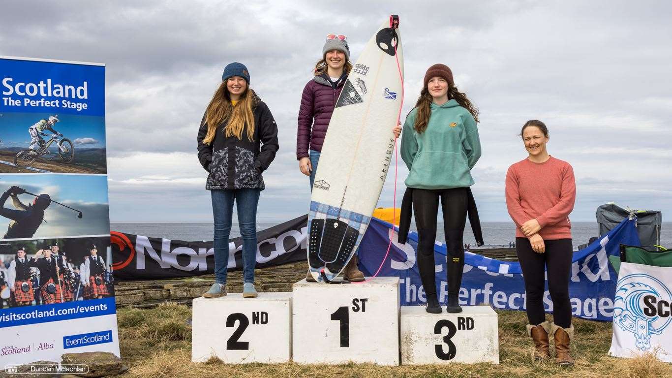 Open women's winner Phoebe Strachan takes the centre spot on the podium, flanked by runner-up Iona McLachlan (NSSC) and Clover Christopherson (BHSC), who was third, along with fourth-placed finalist Catriona Macdonald. Picture: Duncan McLachlan