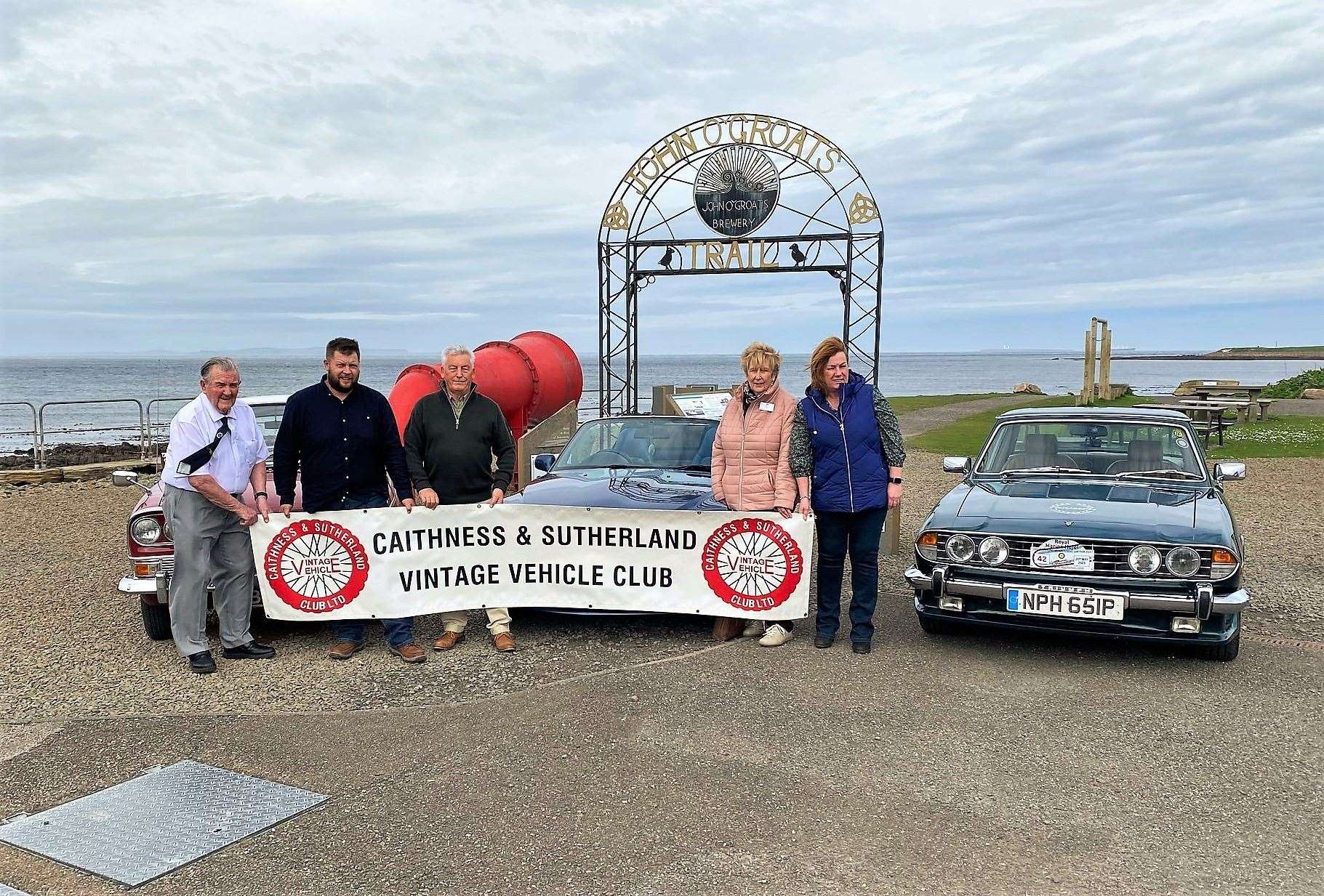 From left, Bert Macleod, James Green, Les Bremner, Ethel Green and Linda Johns at the finishing point in John O'Groats.