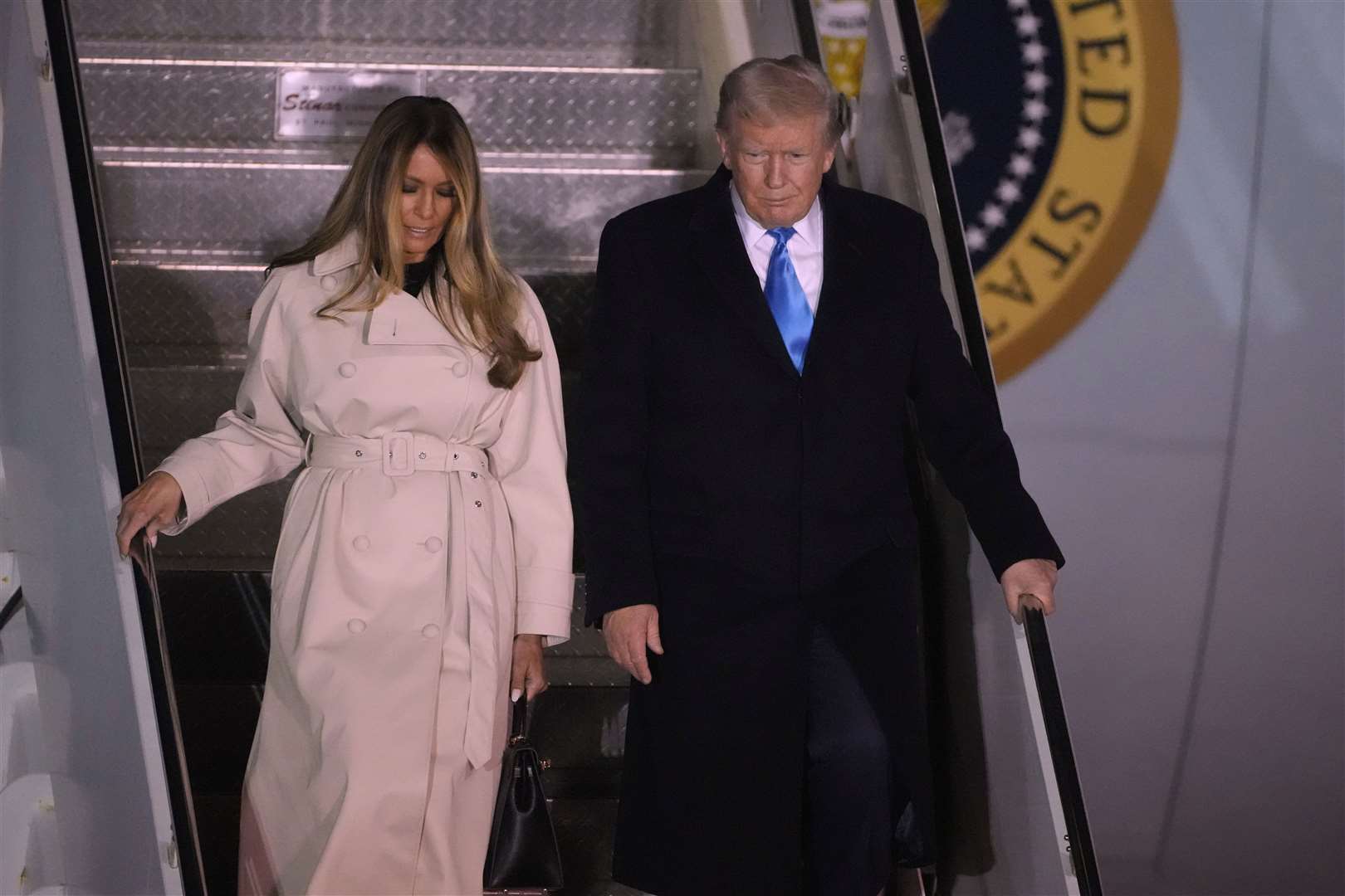 US President Donald Trump and first lady Melania Trump arriving on Air Force One at Rome’s Leonardo da Vinci International airport in Fiumicino on Friday (AP Photo/Markus Schreiber)